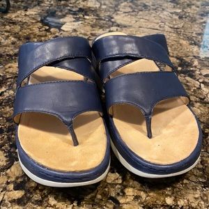 Navy and white flip flops